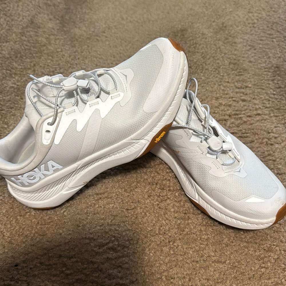 Hoka women’s 7.5 transport sneakers
